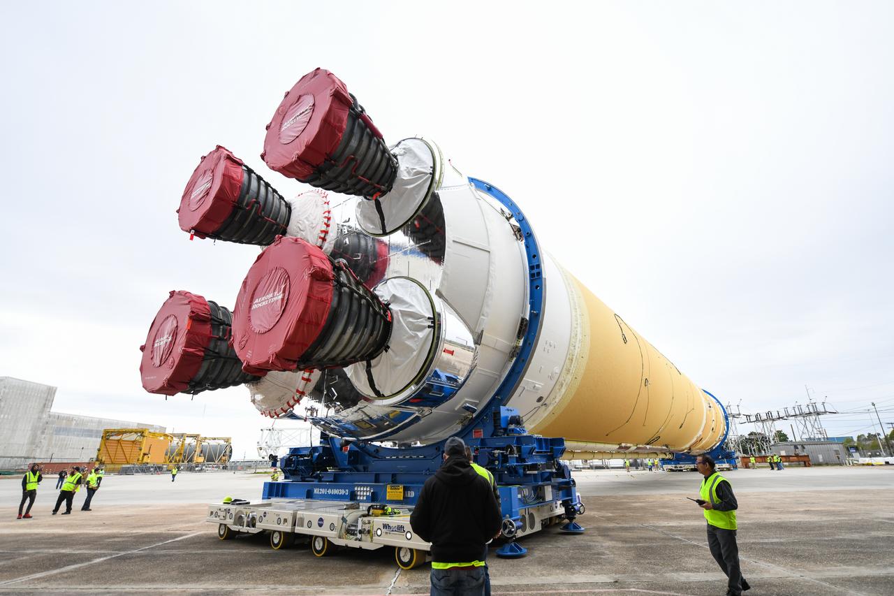 These images show how teams at NASA’s Michoud Assembly Facility in New Orleans moved the core stage, complete with all four RS-25 engines, for NASA’s Space Launch System (SLS) rocket to Building 110 for final shipping preparations on Jan. 1. The SLS core stage includes state-of-the-art avionics, propulsion systems and two colossal propellant tanks that collectively hold 733,000 gallons of liquid oxygen and liquid hydrogen to power its four RS-25 engines. The completed stage, which will provide more than 2 million pounds of thrust to help power the first Artemis mission to the Moon, will be shipped via the agency’s Pegasus barge from Michoud to NASA’s Stennis Space Center near Bay St. Louis, Mississippi, later this month. Once at Stennis, the Artemis rocket stage will be loaded into the B-2 Test Stand for the core stage Green Run test series. The comprehensive test campaign will progressively bring the entire core stage, including its avionics and engines, to life for the first time to verify the stage is fit for flight ahead of the launch of Artemis I.